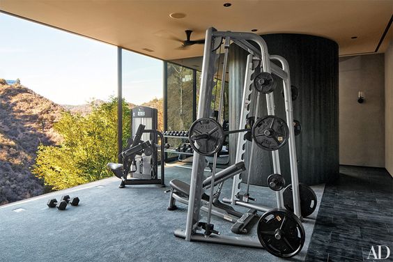 Exercise in a space you enjoy! From Architectural Digest.